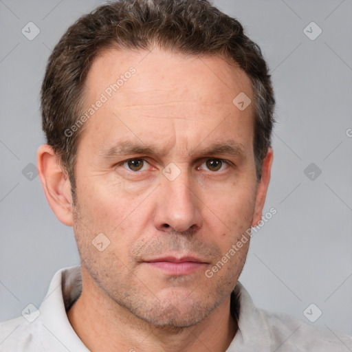 Neutral white adult male with short  brown hair and brown eyes