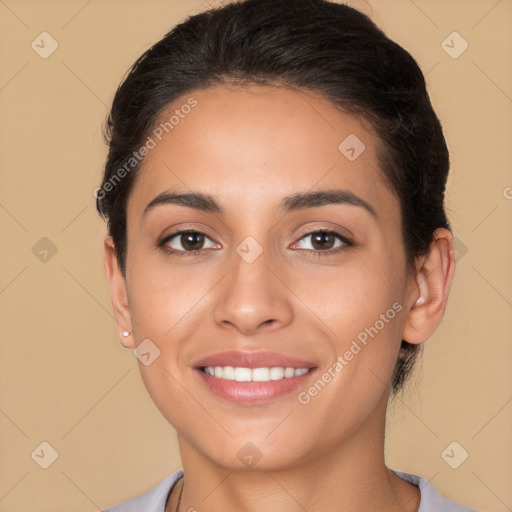 Joyful white young-adult female with short  brown hair and brown eyes