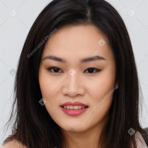 Joyful asian young-adult female with long  brown hair and brown eyes