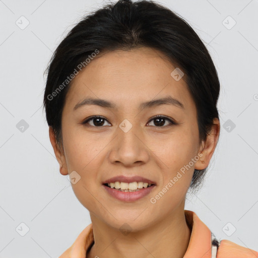 Joyful asian young-adult female with short  brown hair and brown eyes