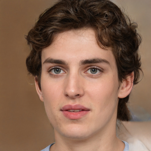 Joyful white young-adult male with medium  brown hair and brown eyes