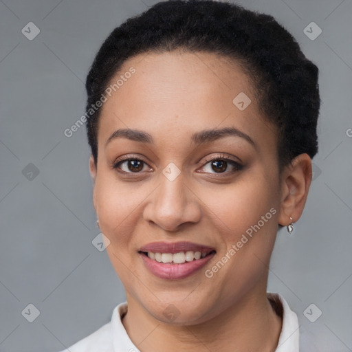 Joyful latino young-adult female with short  brown hair and brown eyes