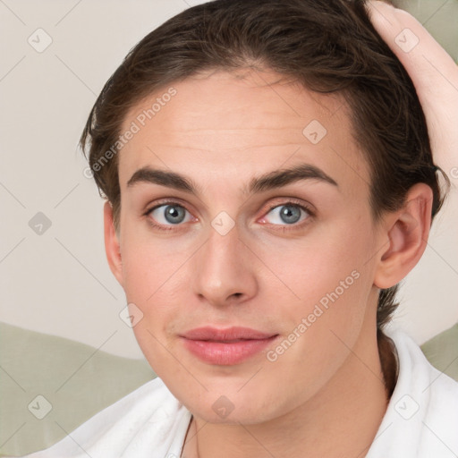 Joyful white young-adult female with short  brown hair and grey eyes