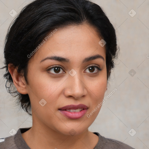 Joyful latino young-adult female with medium  brown hair and brown eyes