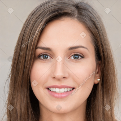 Joyful white young-adult female with long  brown hair and green eyes