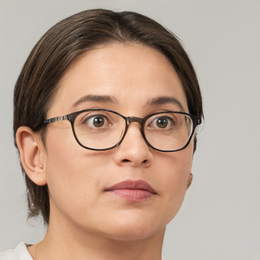 Neutral white young-adult female with medium  brown hair and brown eyes