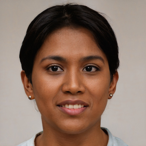 Joyful asian young-adult female with short  brown hair and brown eyes