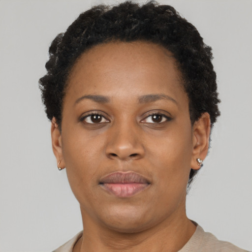 Neutral black young-adult female with short  black hair and brown eyes