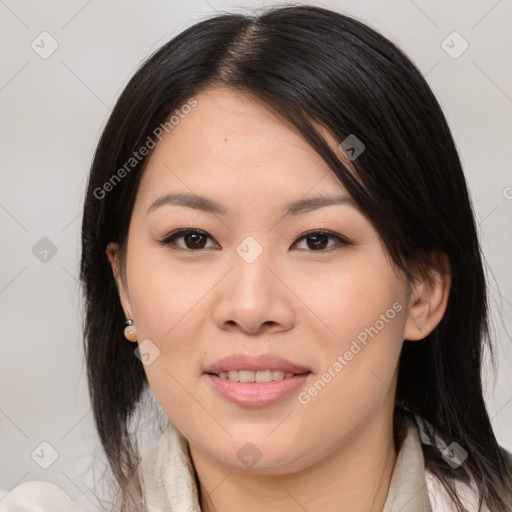 Joyful asian young-adult female with medium  brown hair and brown eyes