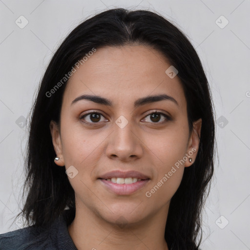 Joyful latino young-adult female with long  brown hair and brown eyes