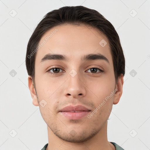 Neutral white young-adult male with short  brown hair and brown eyes