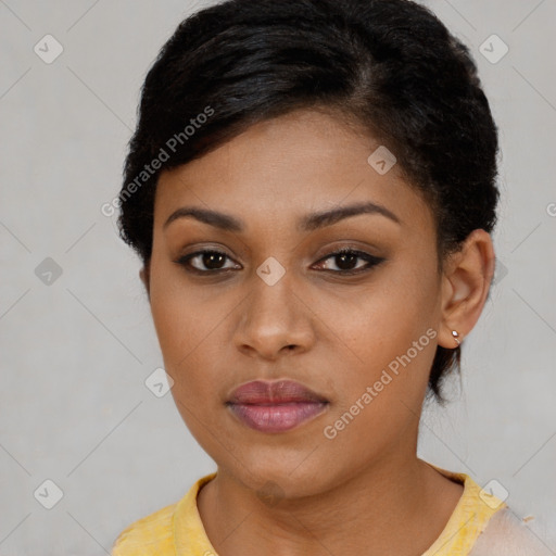 Joyful latino young-adult female with short  brown hair and brown eyes