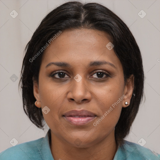 Joyful black young-adult female with medium  brown hair and brown eyes