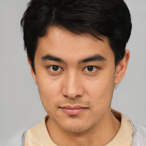 Neutral latino young-adult male with short  brown hair and brown eyes