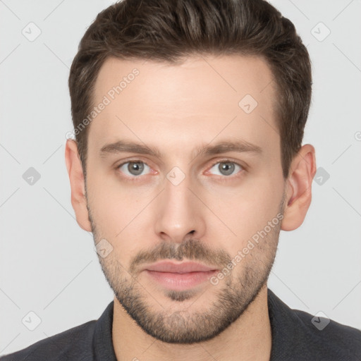 Neutral white young-adult male with short  brown hair and grey eyes