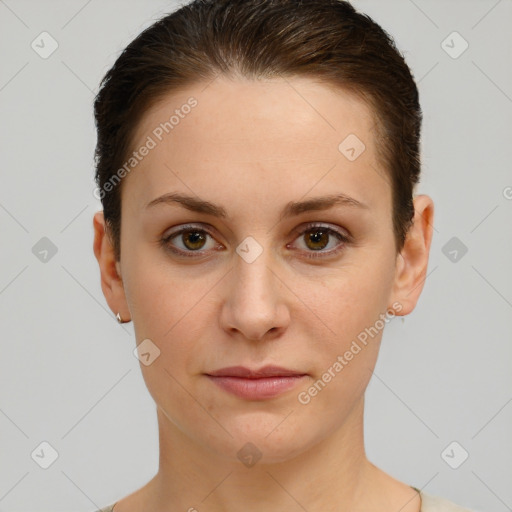 Joyful white young-adult female with short  brown hair and brown eyes