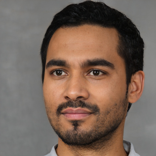 Neutral latino young-adult male with short  black hair and brown eyes