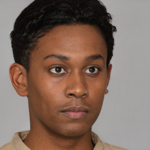 Neutral latino young-adult male with short  brown hair and brown eyes