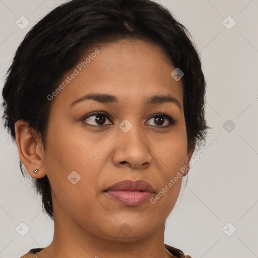 Joyful latino young-adult female with medium  brown hair and brown eyes