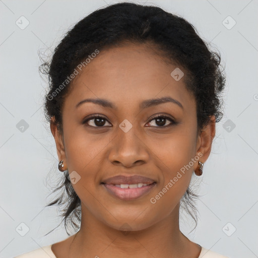 Joyful black young-adult female with medium  brown hair and brown eyes