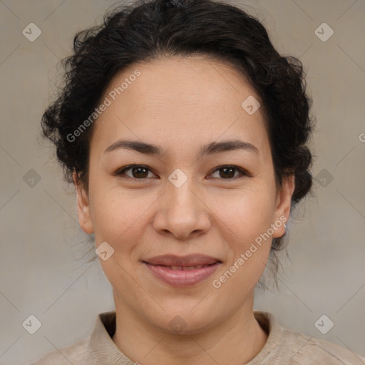 Joyful latino adult female with medium  brown hair and brown eyes