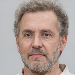 Neutral white middle-aged male with short  brown hair and brown eyes