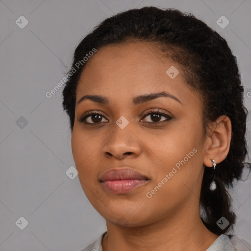 Joyful black young-adult female with medium  black hair and brown eyes