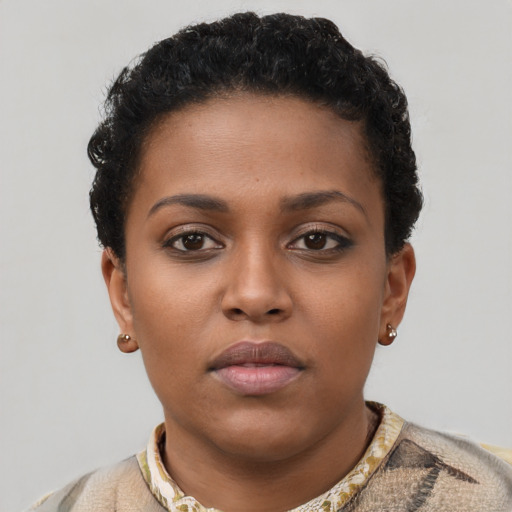 Neutral black young-adult female with short  brown hair and brown eyes