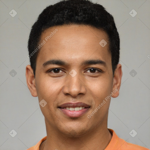 Joyful latino young-adult male with short  brown hair and brown eyes