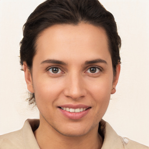 Joyful white young-adult female with short  brown hair and brown eyes