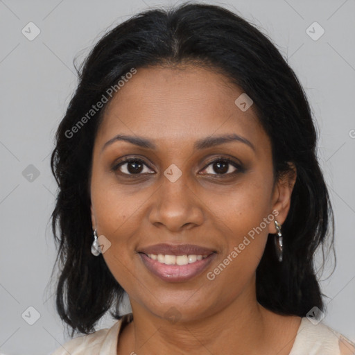 Joyful black young-adult female with medium  brown hair and brown eyes