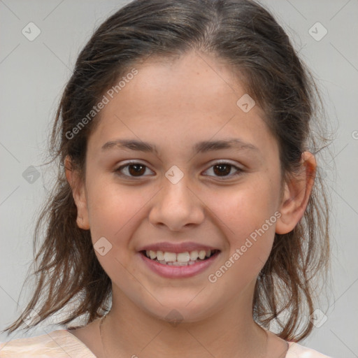 Joyful white child female with medium  brown hair and brown eyes