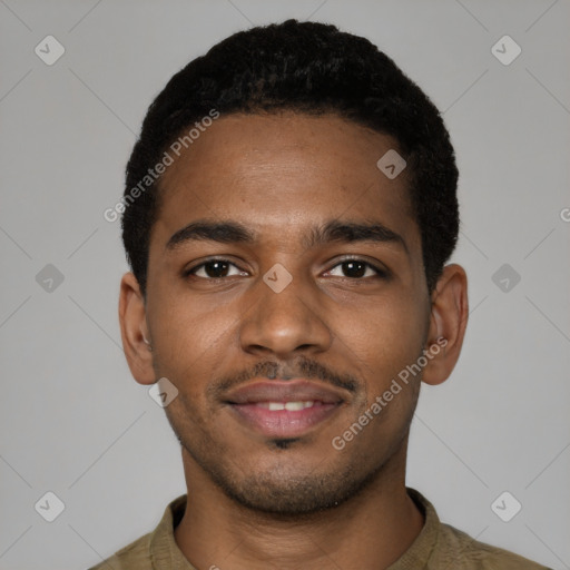 Joyful black young-adult male with short  black hair and brown eyes