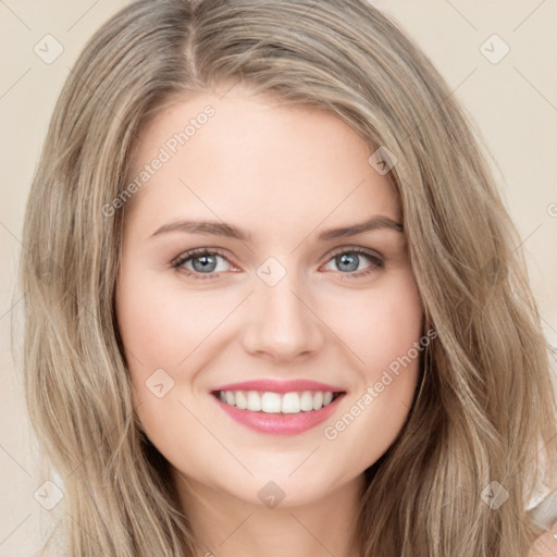 Joyful white young-adult female with long  brown hair and green eyes