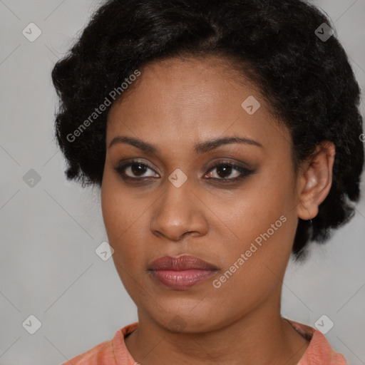 Joyful latino young-adult female with short  black hair and brown eyes