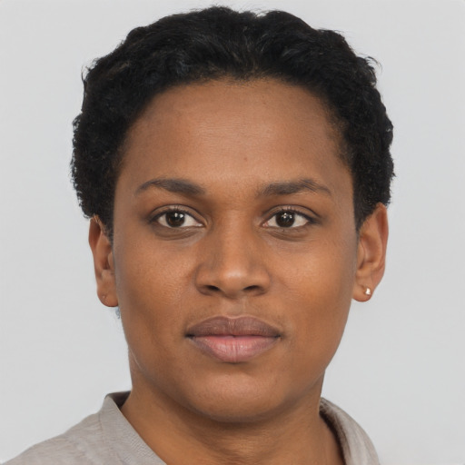Neutral black young-adult female with short  brown hair and brown eyes