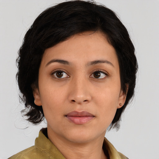 Neutral white young-adult female with medium  brown hair and brown eyes