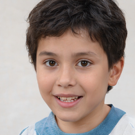 Joyful white child male with short  brown hair and brown eyes