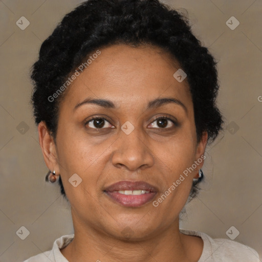 Joyful black adult female with short  brown hair and brown eyes