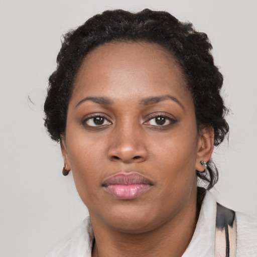Neutral black young-adult female with short  black hair and brown eyes