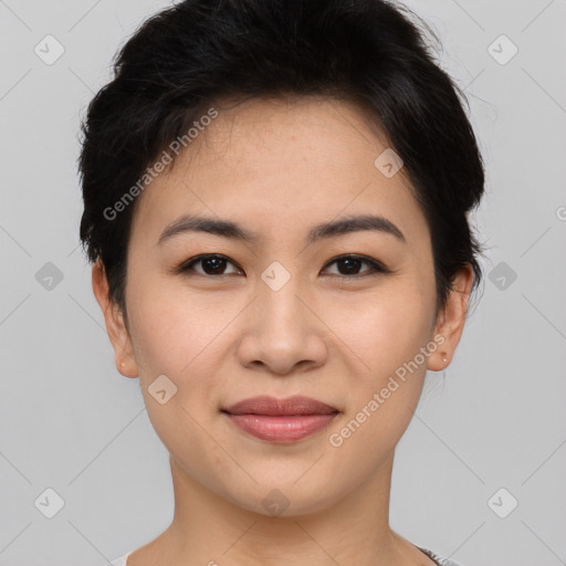 Joyful asian young-adult female with short  brown hair and brown eyes