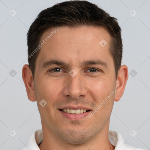 Joyful white young-adult male with short  brown hair and brown eyes