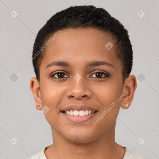 Joyful latino child female with short  brown hair and brown eyes