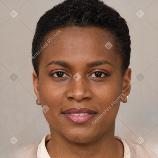 Joyful black young-adult female with short  brown hair and brown eyes