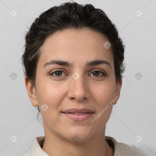 Joyful white young-adult female with short  brown hair and brown eyes