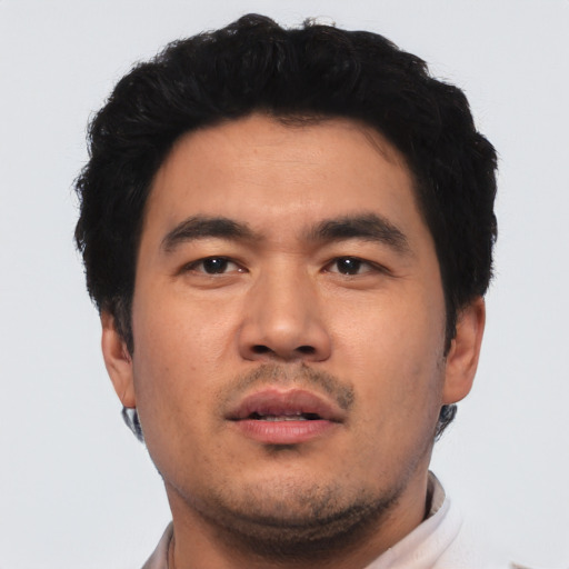 Neutral asian young-adult male with short  black hair and brown eyes