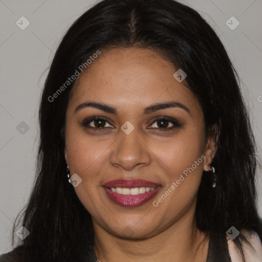 Joyful latino young-adult female with long  brown hair and brown eyes