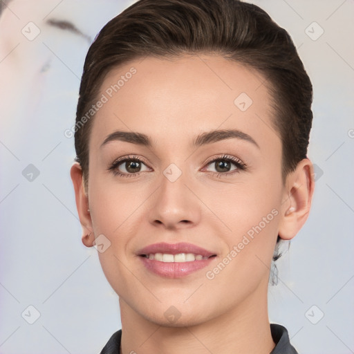 Joyful white young-adult female with short  brown hair and brown eyes