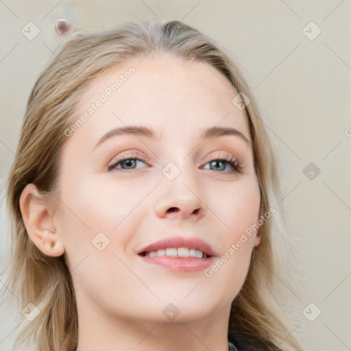 Joyful white young-adult female with medium  brown hair and blue eyes