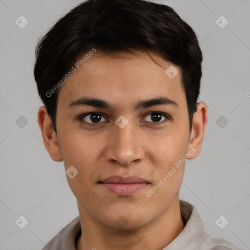 Joyful latino young-adult male with short  brown hair and brown eyes